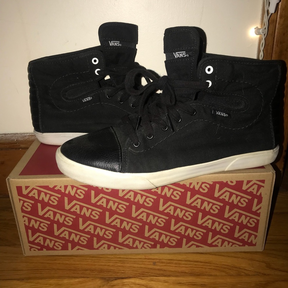 women’s black Vans high tops